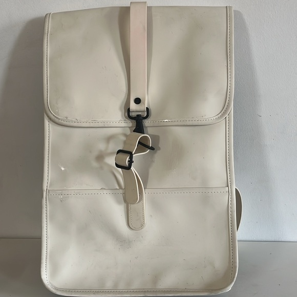 RAINS Shield Rucksack is a clean and functional backpack. Elegant Cream Backpack - Picture 5 of 11